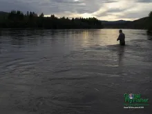 Computer screen wallpaper: Solitary angler in the sunset